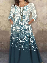 Vestido estampado de manga larga con cuello redondo y bolsillos